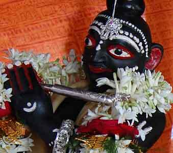Sri Gopinatha, the black stone Deity that Govinda Ghosh established at Agradwipa and which devotional tradition says he served for the rest of his life.