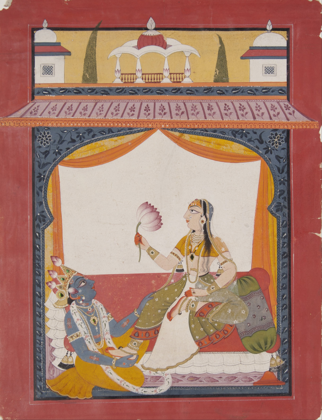 A Mankot-school (Punjab Hills) miniature painting of Krishna massaging Radha's feet, a scene likely drawn from the Gita Govinda, illustrating the poem's spread into Pahari painting.