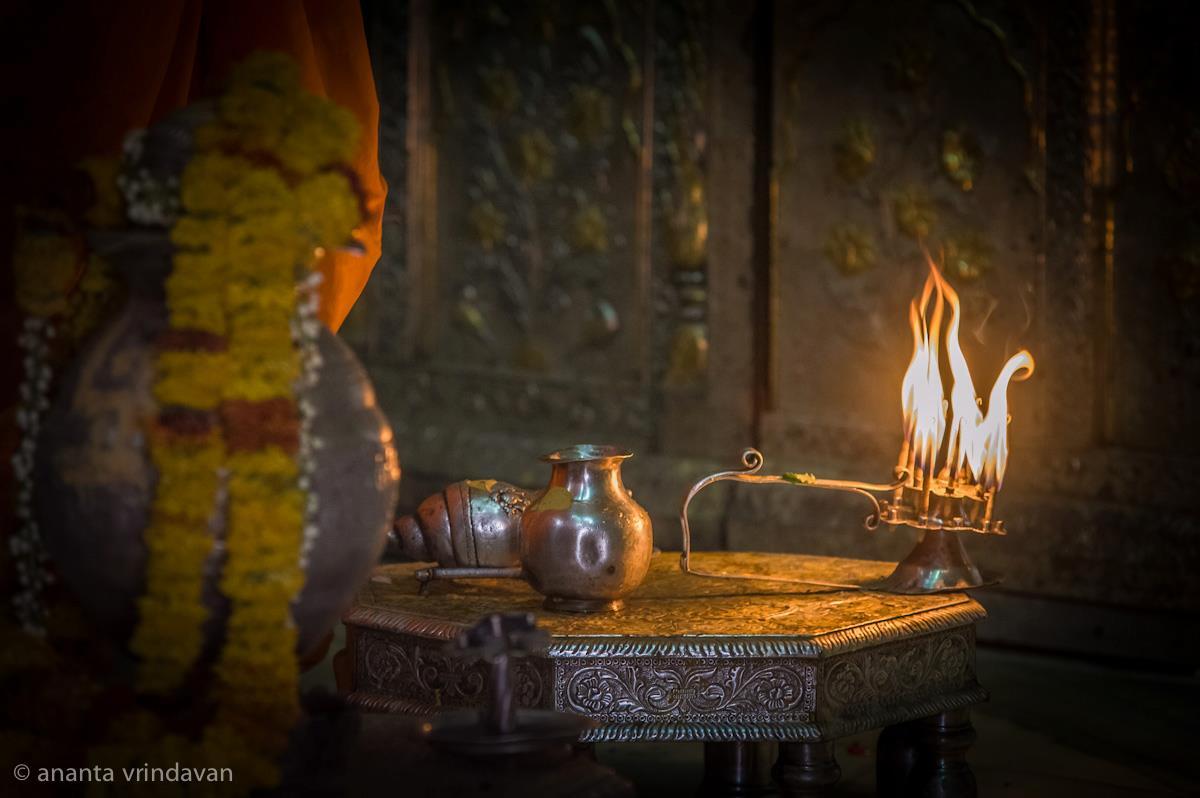 Temple paraphernalia for Deity offering — conch, water pot and arati lamp — of the kind Narahari Chakravarti Thakura prepared and used daily in his decades of service to Govindaji.