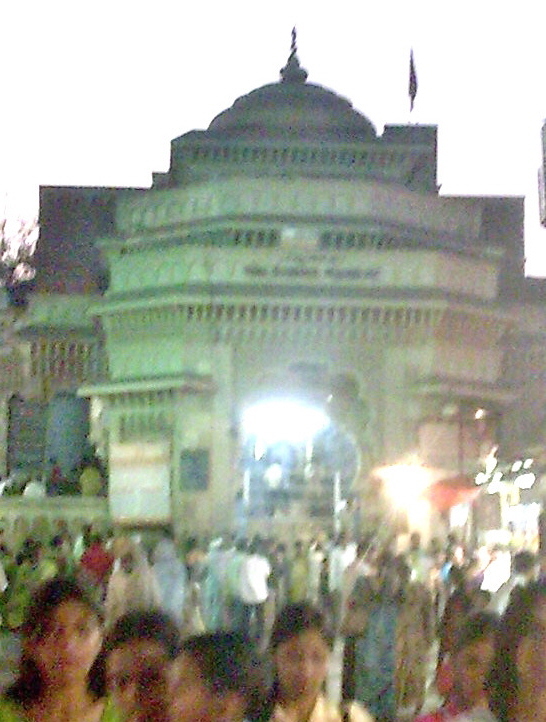 The chief gate of the Vithoba (Vitthala) Temple at Pandharpur, Maharashtra, at night with pilgrims gathered outside — the temple Chaitanya Mahaprabhu visited during His eleven-day stay after learning of Shankararanya's disappearance there.