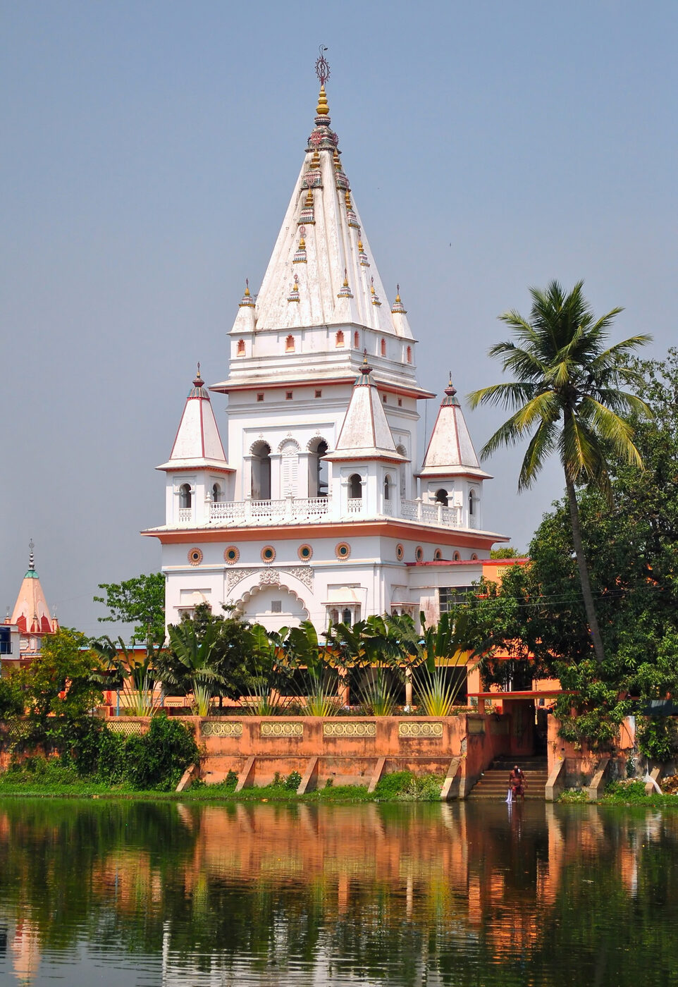 Sri Yogapith, the temple marking Chaitanya Mahaprabhu's birthplace at Mayapur, established in the 1880s by Bhaktivinoda Thakura - the temple facade and the neem tree courtyard.